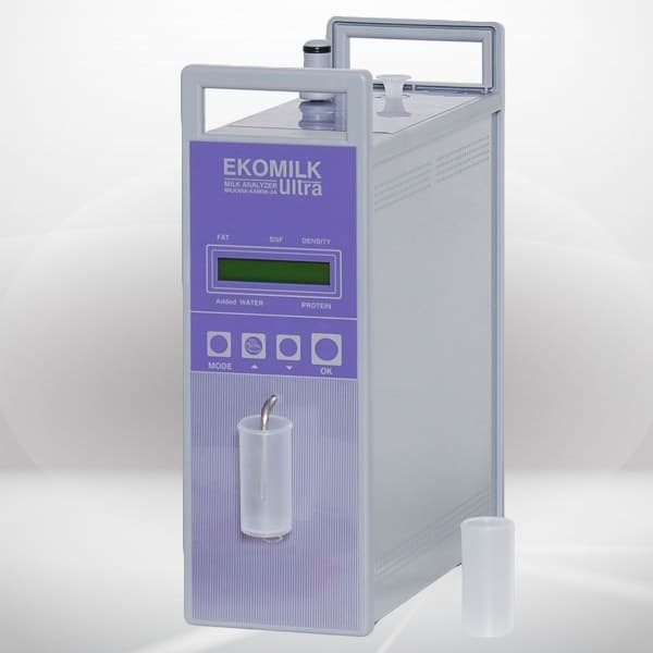 Ekomilk Ultra Analyzer machine testing milk parameters like added water and density.